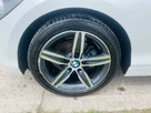 2013-bmw-1-series-16-116i-sport-ss-3d-small-52