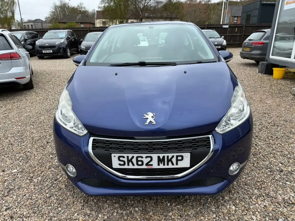 2012-peugeot-208-14-active-3d-big-6