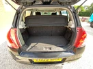2009-suzuki-swift-13td-small-12