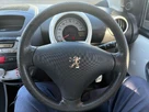 2011-peugeot-107-10-sportium-3d-small-16