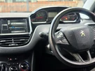 2013-peugeot-208-12-active-3d-small-36