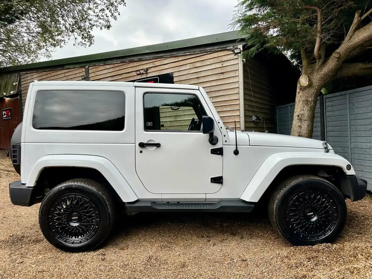 2013-jeep-wrangler-28crd-sahara-3d-auto-big-4