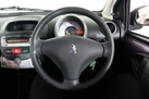 2013-peugeot-107-10-active-3d-small-11