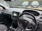 2012-peugeot-208-14-active-3d-small-7