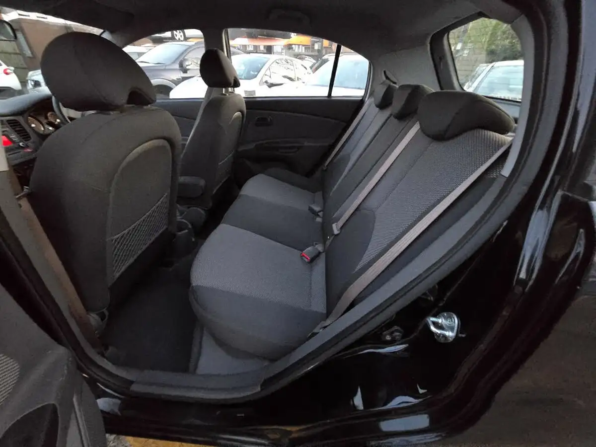 2010-kia-rio-14-domino-auto-big-4