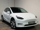 2023-tesla-model-y-e-rwd-small-0