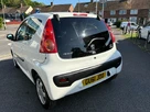 2011-peugeot-107-10-sportium-3d-small-3