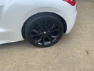 2012-peugeot-rcz-20td-gt-small-16