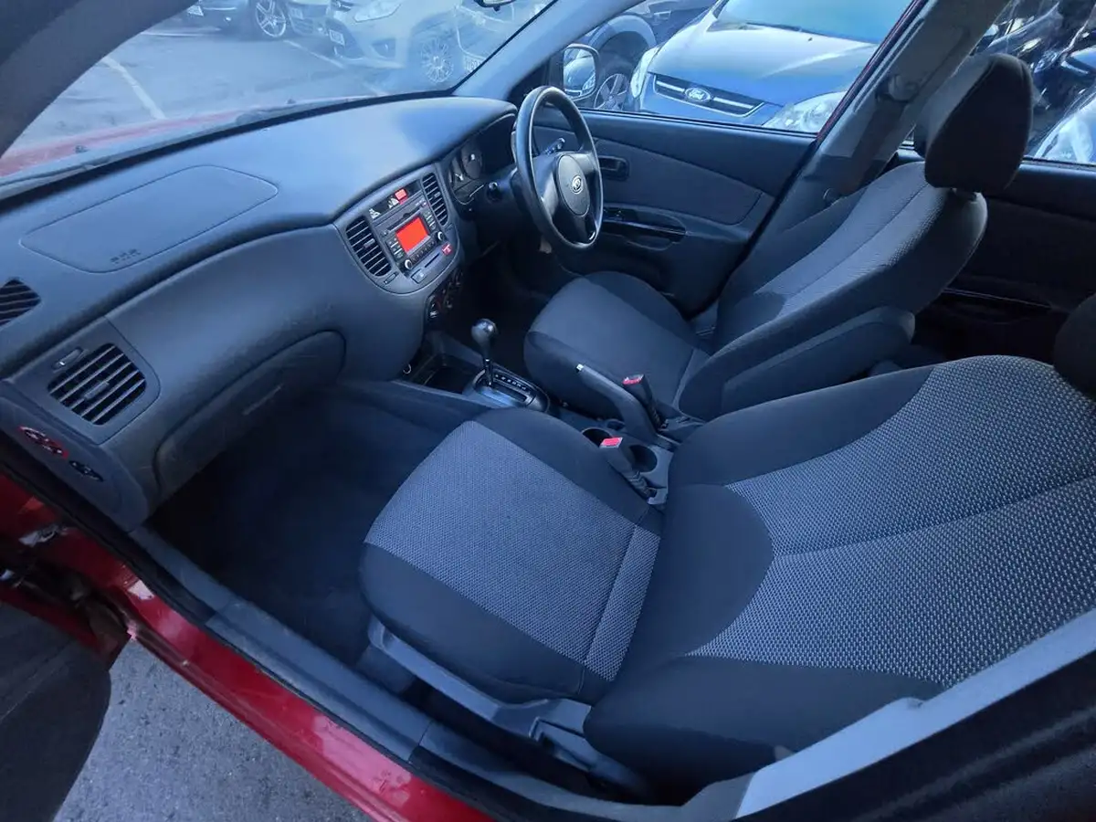 2010-kia-rio-14-strike-auto-big-21