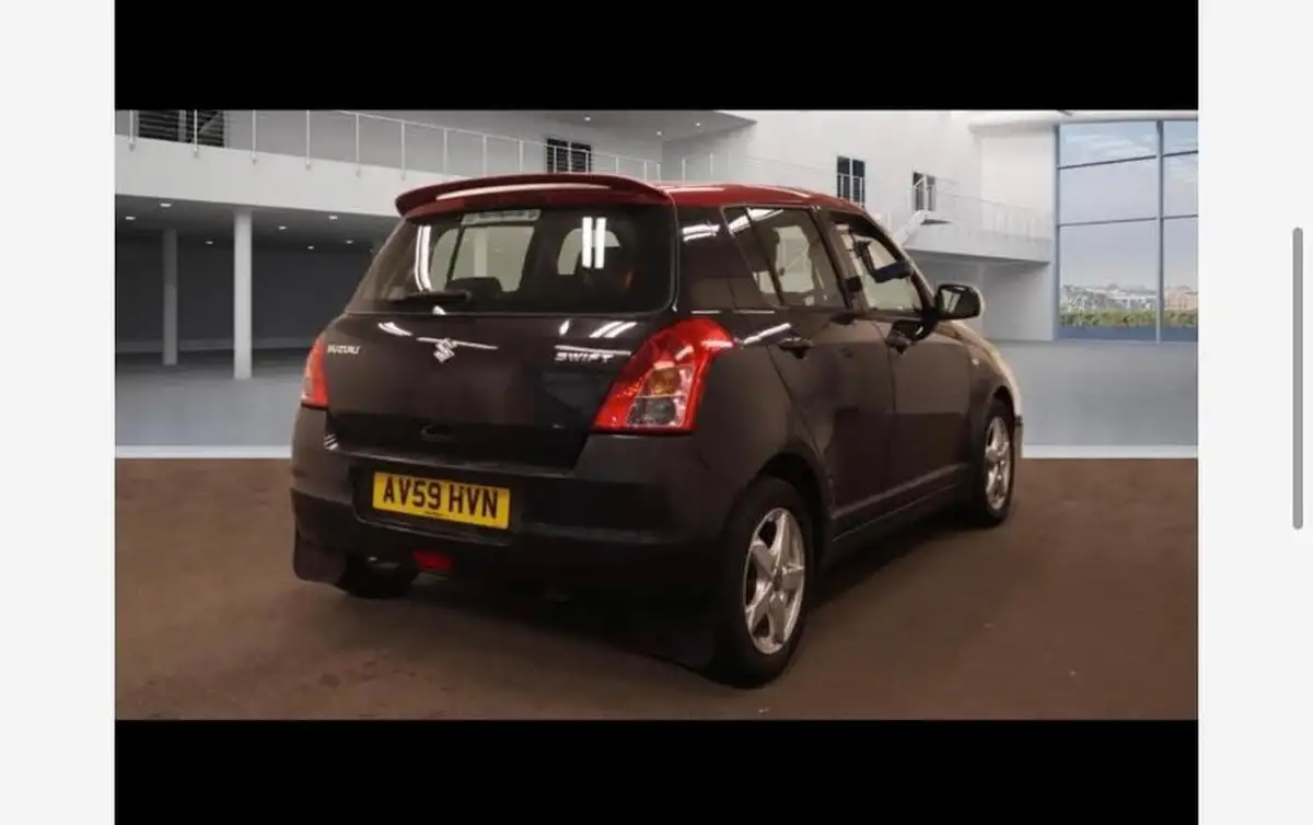 2009-suzuki-swift-15-glx-5d-big-2