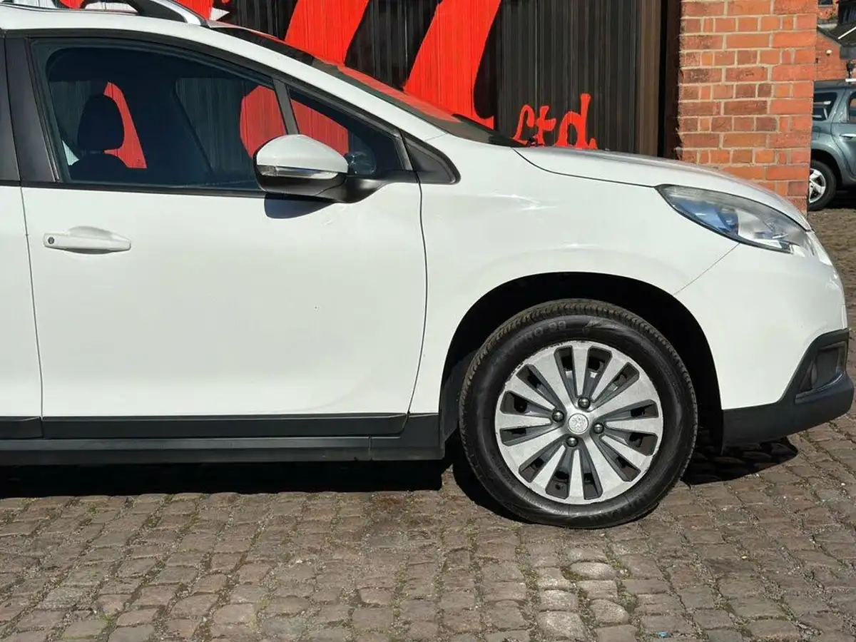 2014-peugeot-2008-crossover-16e-hdi-active-egc-big-10