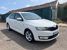 2014-skoda-rapid-12-elegance-greentech-small-1