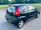 2009-peugeot-107-10-verve-3d-small-1